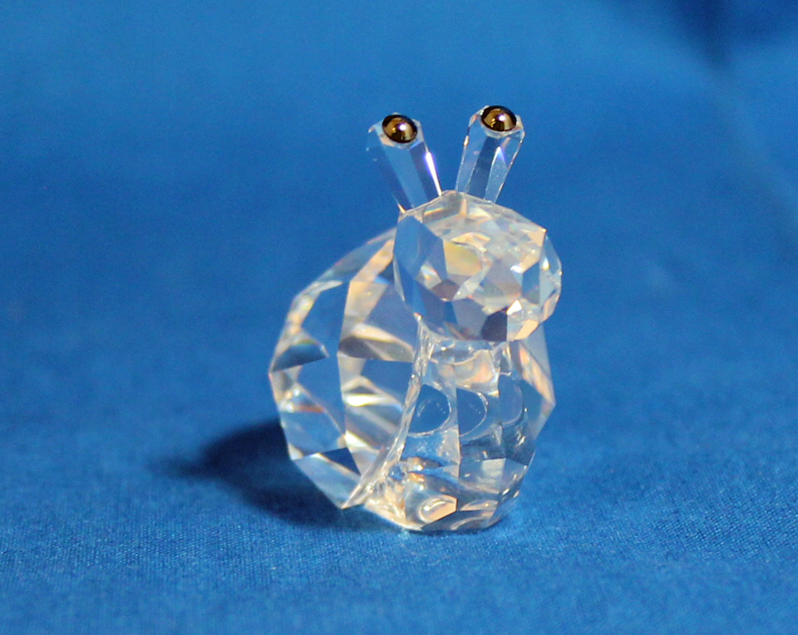 swarovski crystal snail figurine